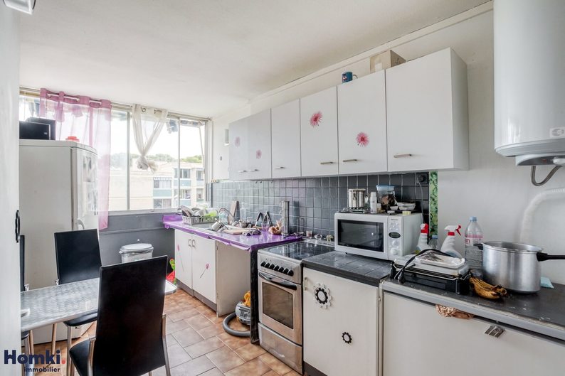 Homki - Vente appartement  de 105.0 m² à Marseille 13008